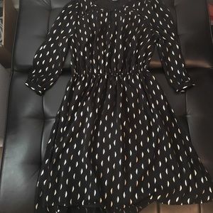 Black long sleeved dress with gold 1/2 moon detail